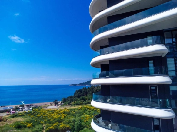 Dvosoban stan 116 m² u novom kompleksu na prvoj liniji do mora – Bečići, Budva