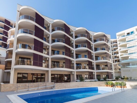 Nov dvosoban stan sa pogledom na more, Bečići, Budva — fotografija 10